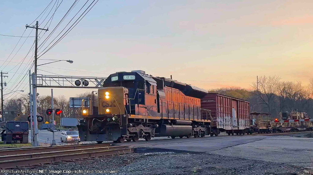 CSX 1719 leads an early morning rail train west.